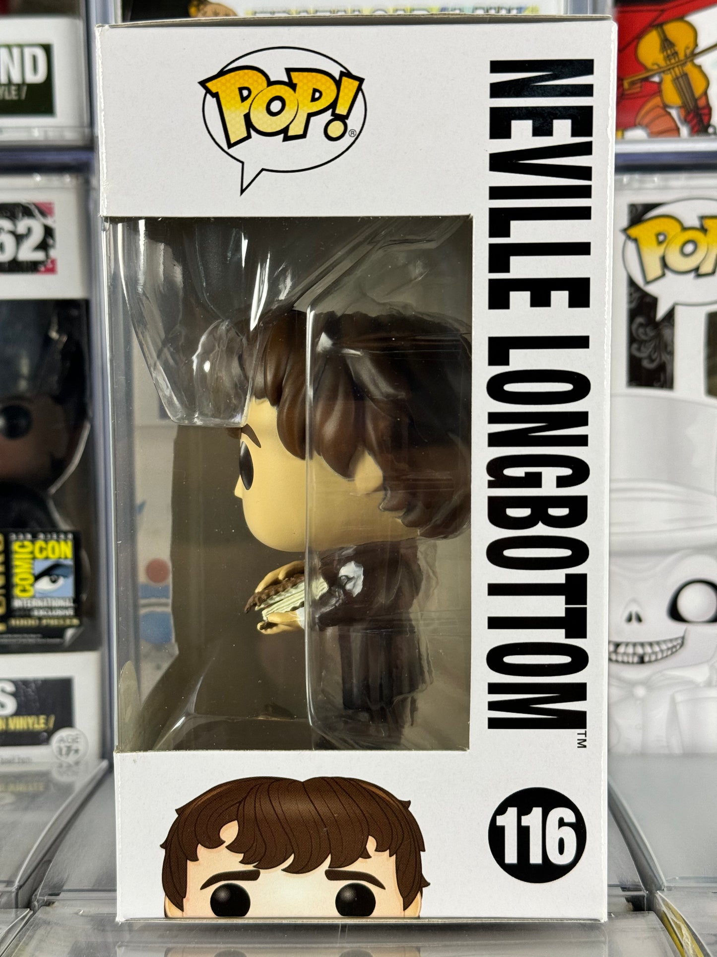 Wizarding World of Harry Potter - Neville Longbottom (w/ Monster Book) (116)