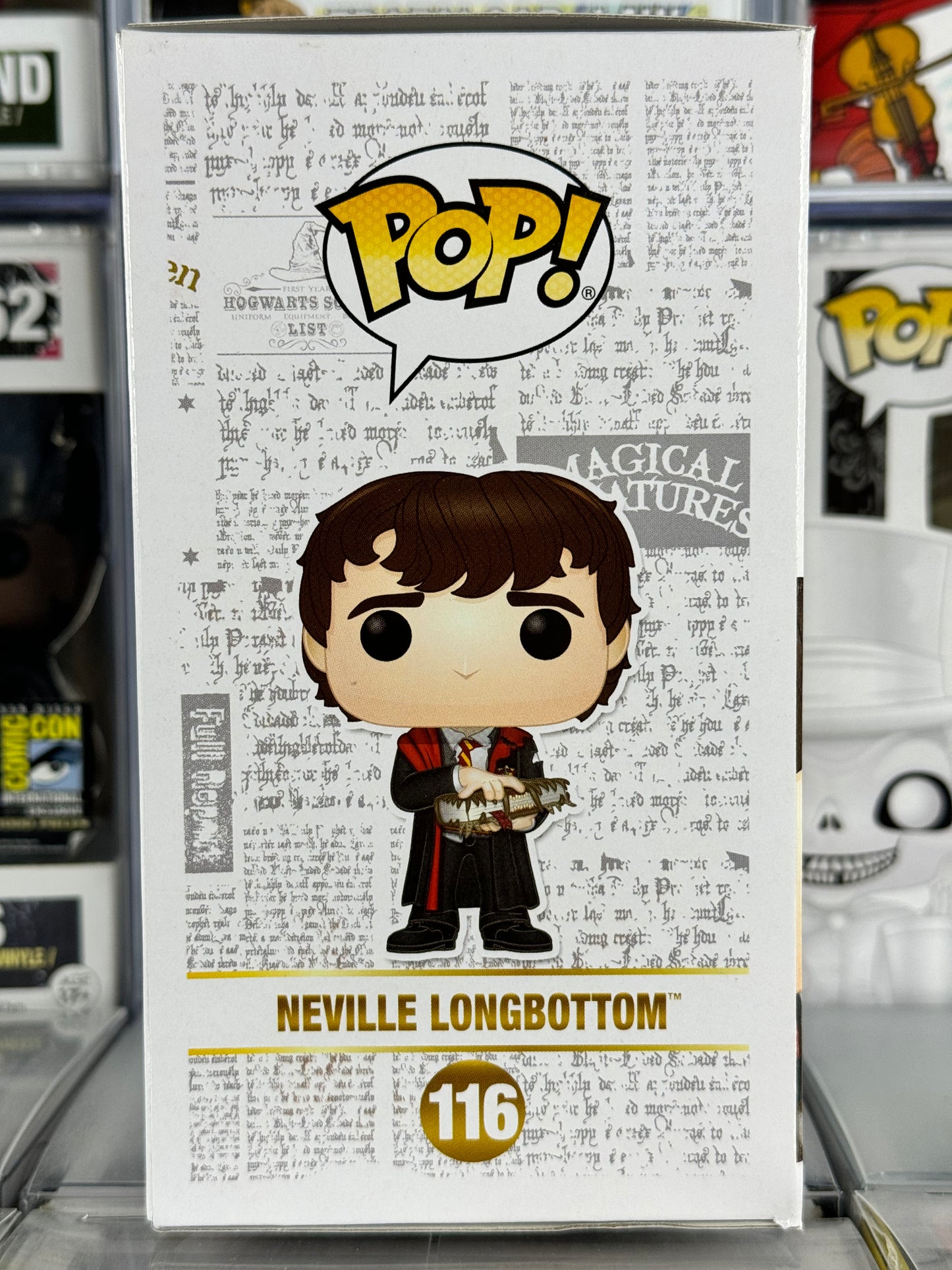 Wizarding World of Harry Potter - Neville Longbottom (w/ Monster Book) (116)