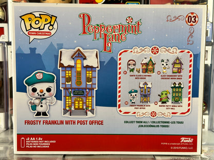 Peppermint Lane - Navidad en la ciudad - Frosty Franklin con oficina de correos (se ilumina) (03) Exclusivo de GameStop abovedado